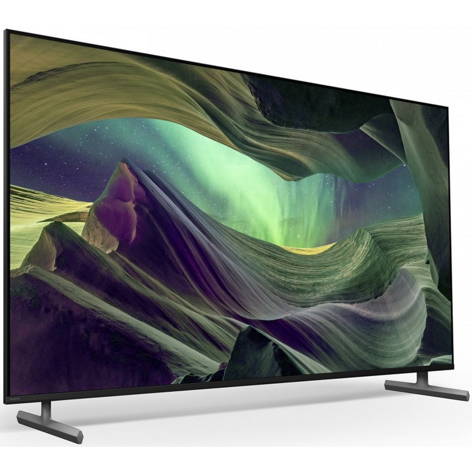 Breedbeeld-tv. Toont een landschap met een paarse en groene lucht.