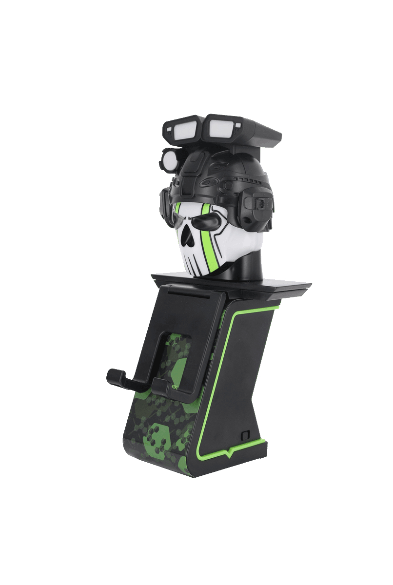 Ein Gaming-Headset-Ständer mit Totenkopf-Design und Lichtern auf einem schwarzen Ständer.