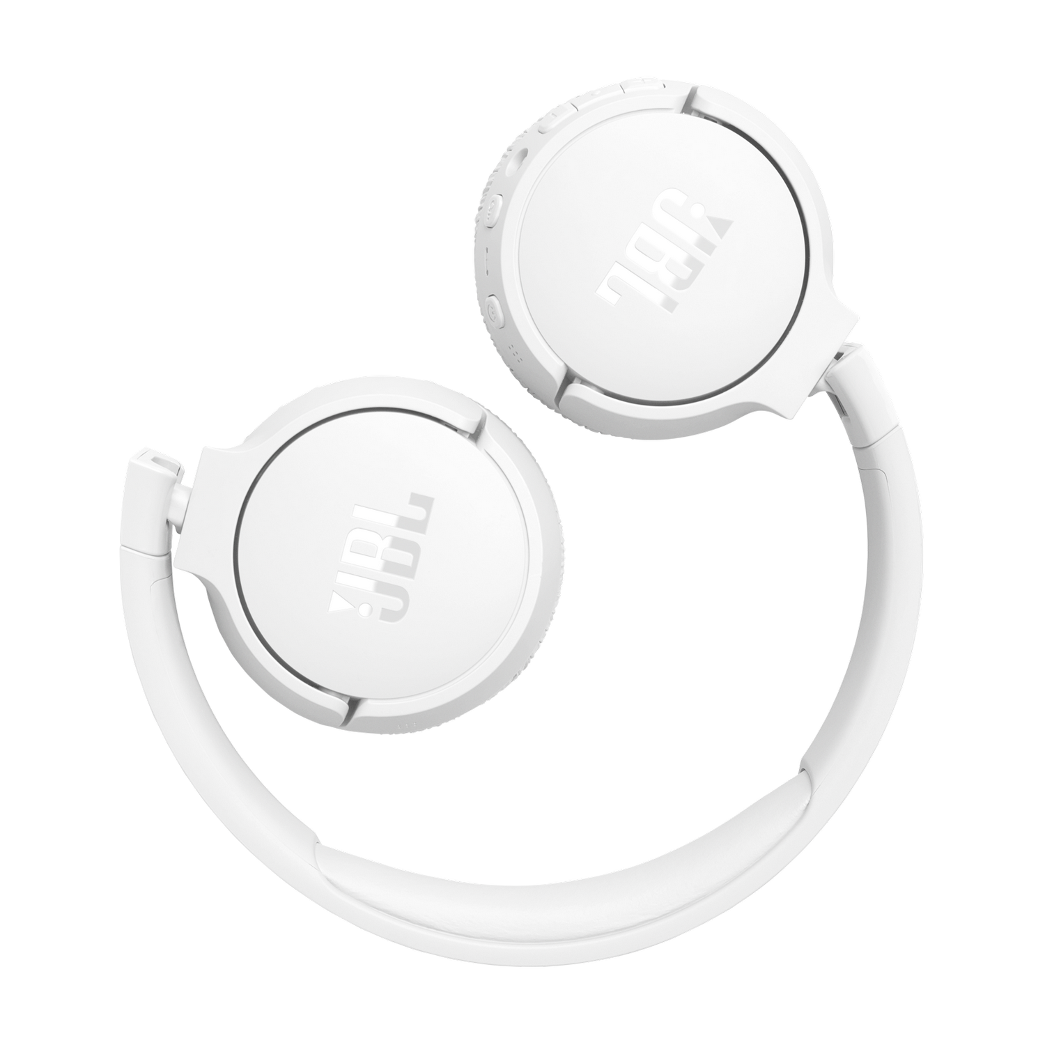 White JBL headphones. The headphones are unfolded, lying on a black surface.