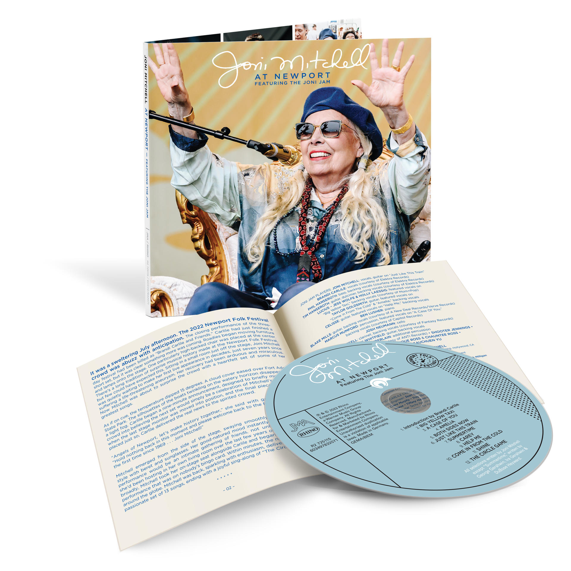 Joni Mitchell CD-Cover. Frau singt mit erhobenen Armen. Geöffnete CD und Booklet.
