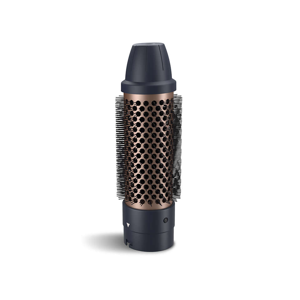 Cepillo para peinar el cabello. Negro y oro rosa. Cerdas alrededor de un barril.