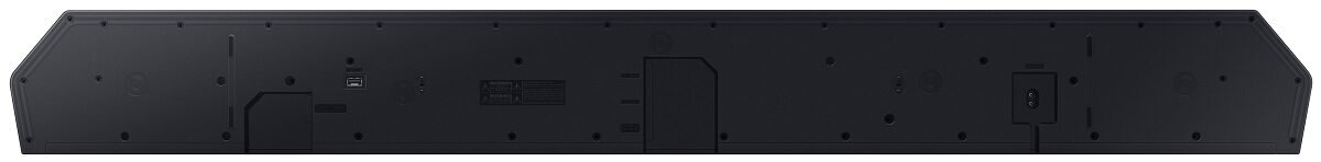 Tył czarnego soundbaru, pokazujący różne porty. Jest prostokątny i smukły.