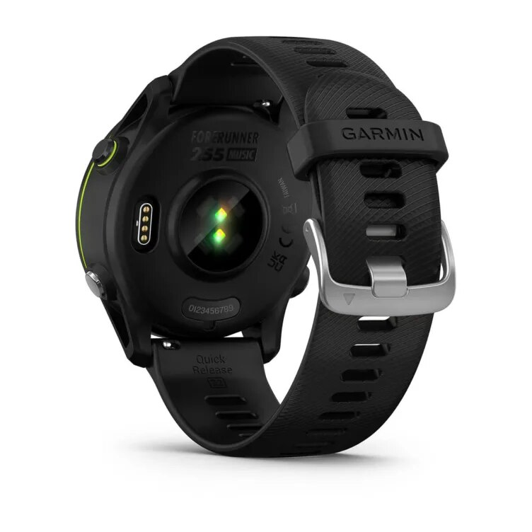 Tył smartwatcha Garmin Forerunner 255 Music. Pokazuje czujniki, port ładowania i czarny pasek.