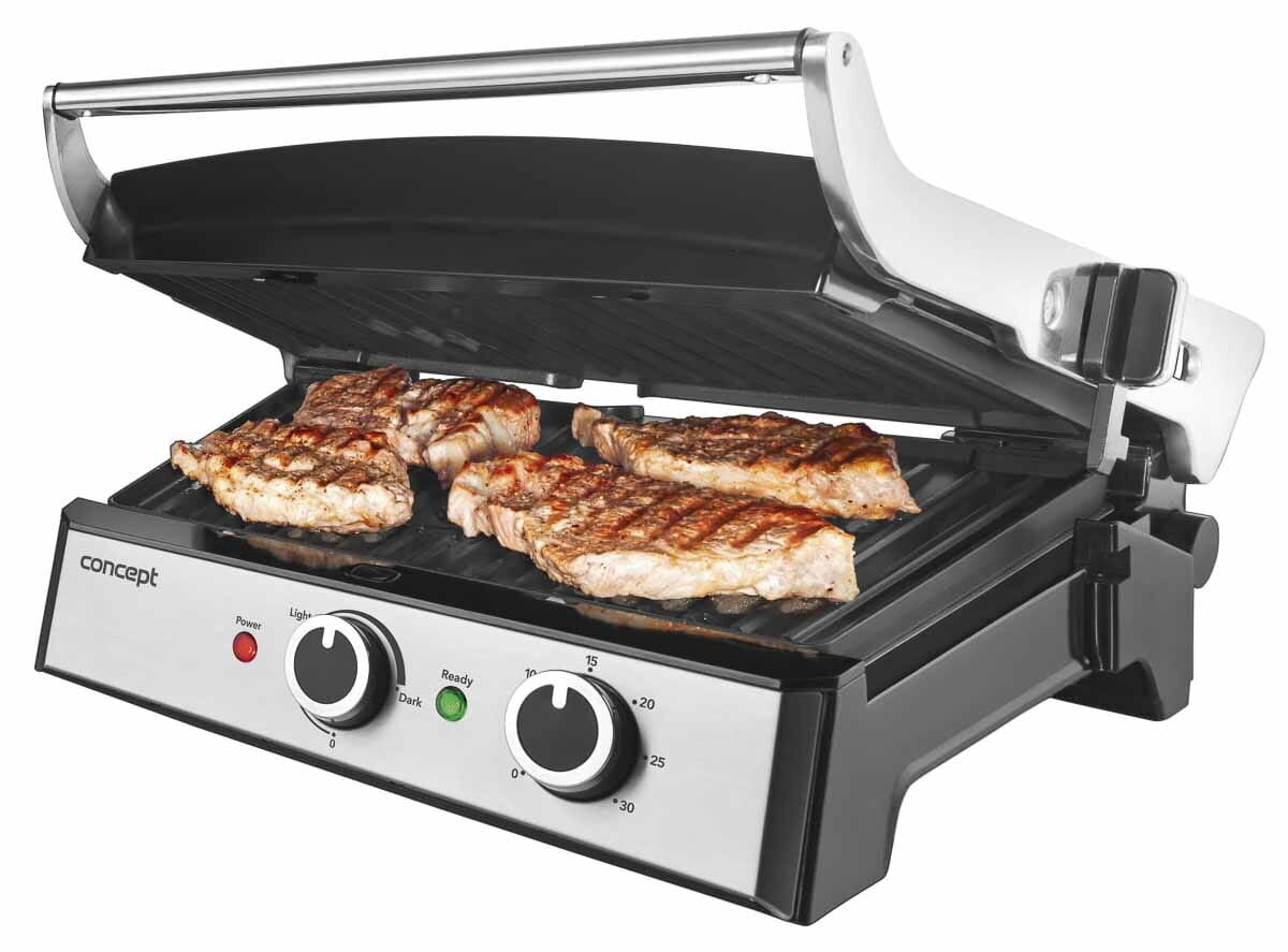 Otwarty grill z czterema grillowanymi stekami i pokrętłami sterowania z przodu.