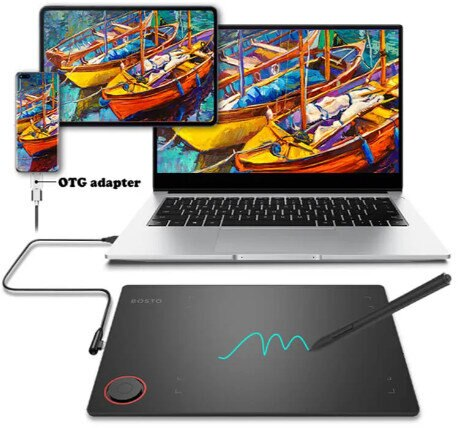 Laptop, tablet i telefon połączone kablem z tabletem graficznym. Pióro leży na tablecie.