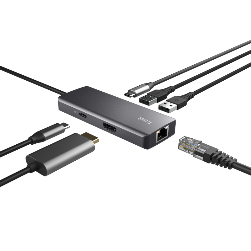 Egy sötétszürke hub több kábellel, beleértve az USB-t és az Ethernetet.