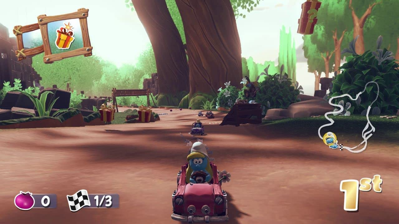 Escena del juego de carreras de karts de los Pitufos con un Pitufo conduciendo un coche rojo en una pista de carreras.