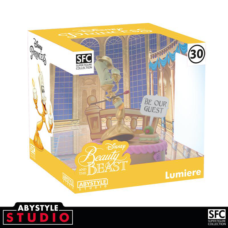Eine „Die Schöne und das Biest“-Figur in einer Box, mit einem Licht und den Worten „Lumiere“.
