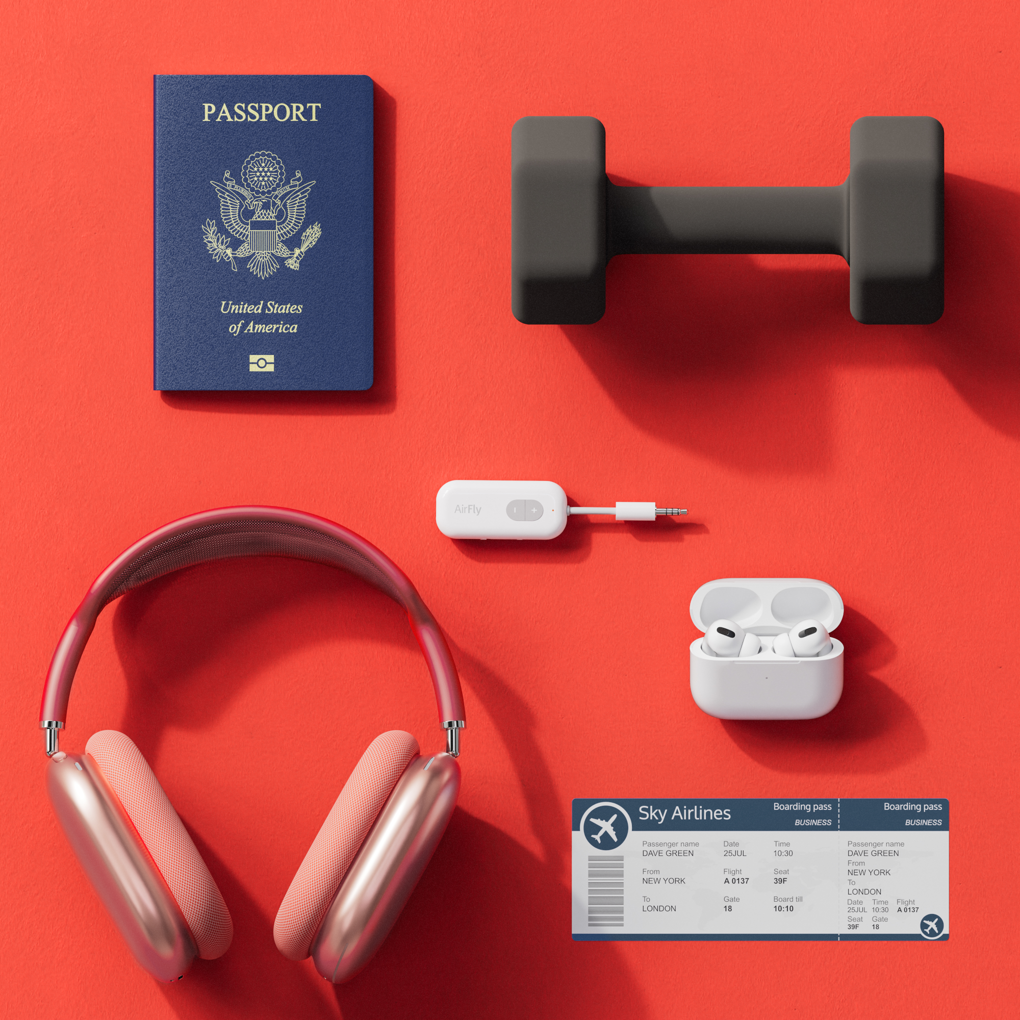 Reisepass, Kopfhörer, AirPods, Hantel, Bordkarte auf roter Oberfläche.