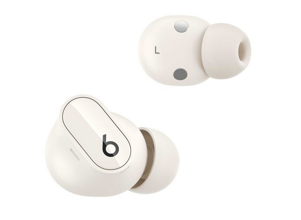 Dos auriculares Beats blanquecinos sobre fondo blanco. Uno tiene una 'L'.