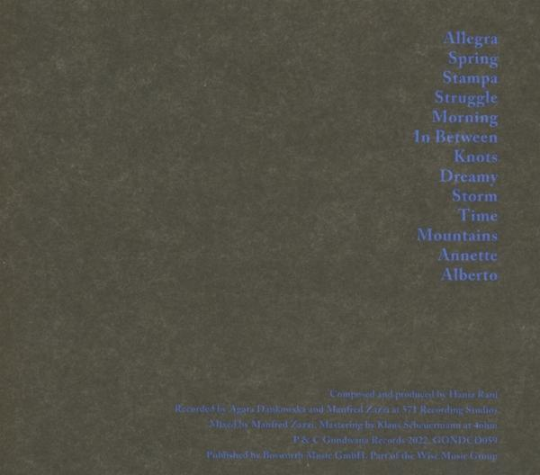 Text, das Songtitel auf dunklem Hintergrund auflistet.