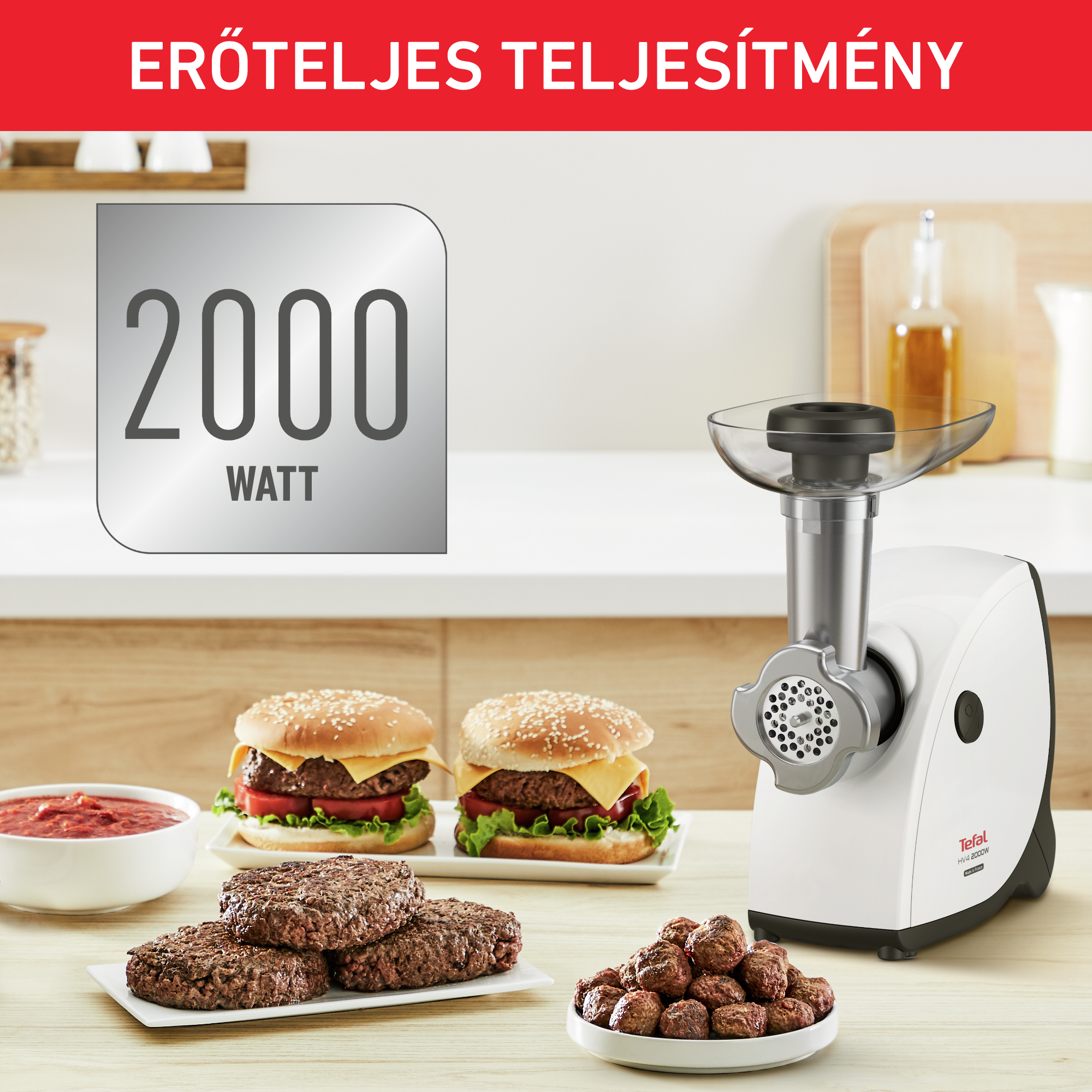 Étel daráló hamburger pogácsákkal és húsgombócokkal. Egy tábla 2000 WATT felirattal.