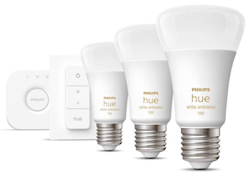 Cztery białe żarówki Philips Hue i mostek i ściemniacz Philips Hue.