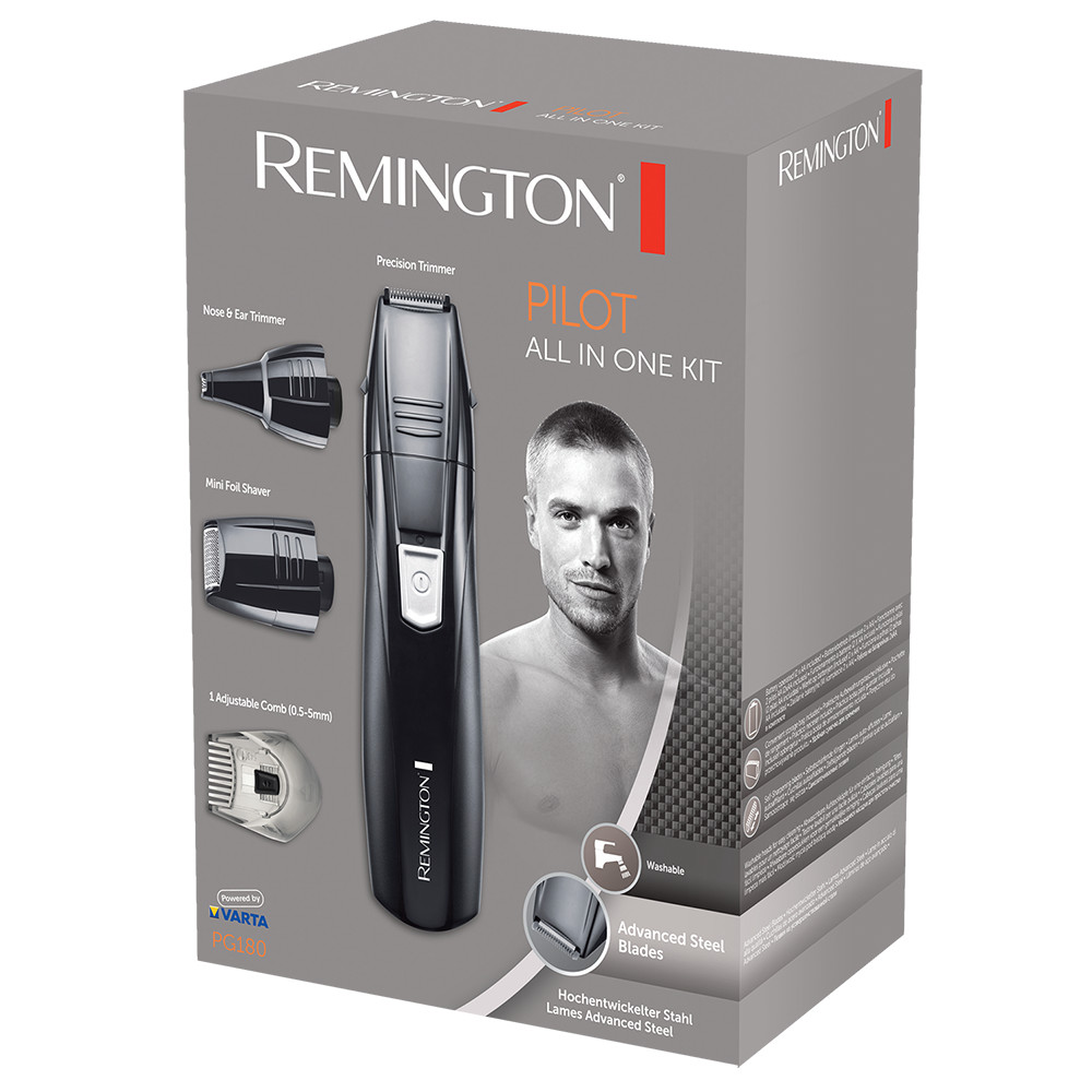 Doboz férfi arccal, trimmelővel és kiegészítőkkel, 'Remington Pilot All-in-One Kit' felirattal.