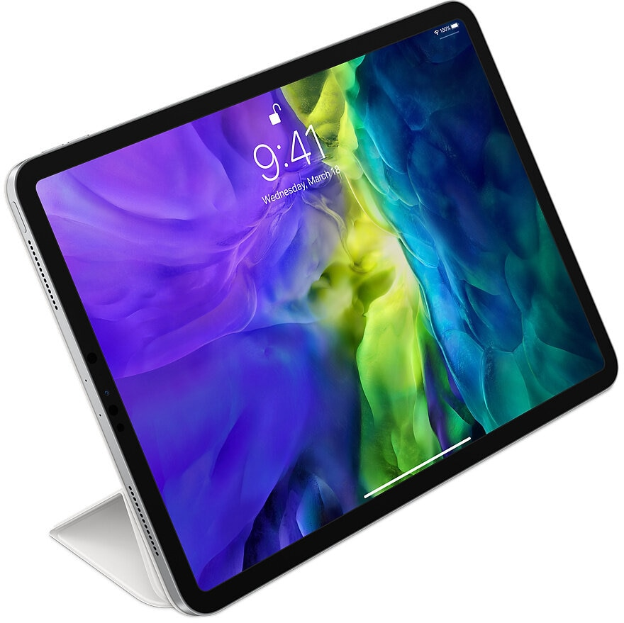 Apple iPad Pro z klawiaturą Magic Keyboard, z fioletową i niebieską tapetą.