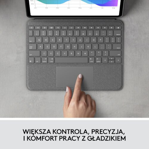 Dłoń używająca szarego touchpada na klawiaturze, z tekstem o precyzji i komforcie.