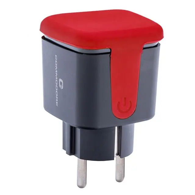 Schwarzer und grauer Commodore-Netzadapter mit roter Oberseite und Stiften.
