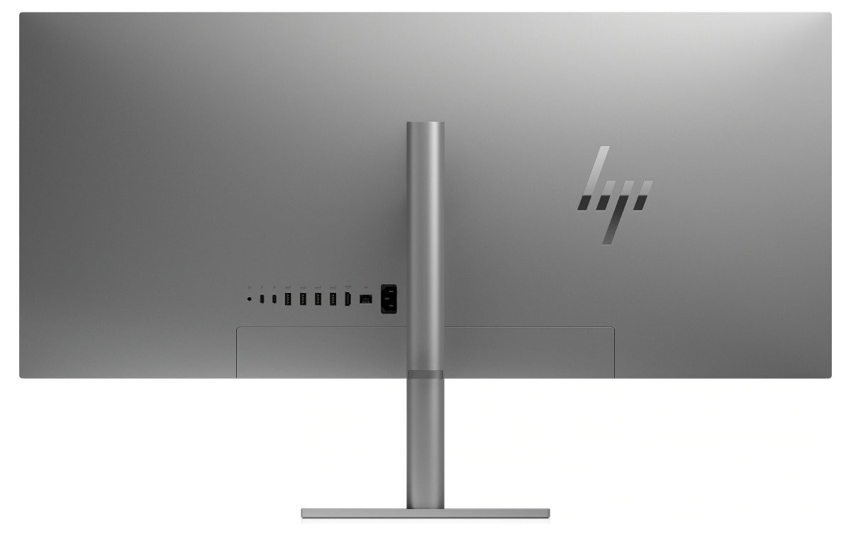 Tył szarego monitora HP. Posiada porty i logo HP z tyłu.