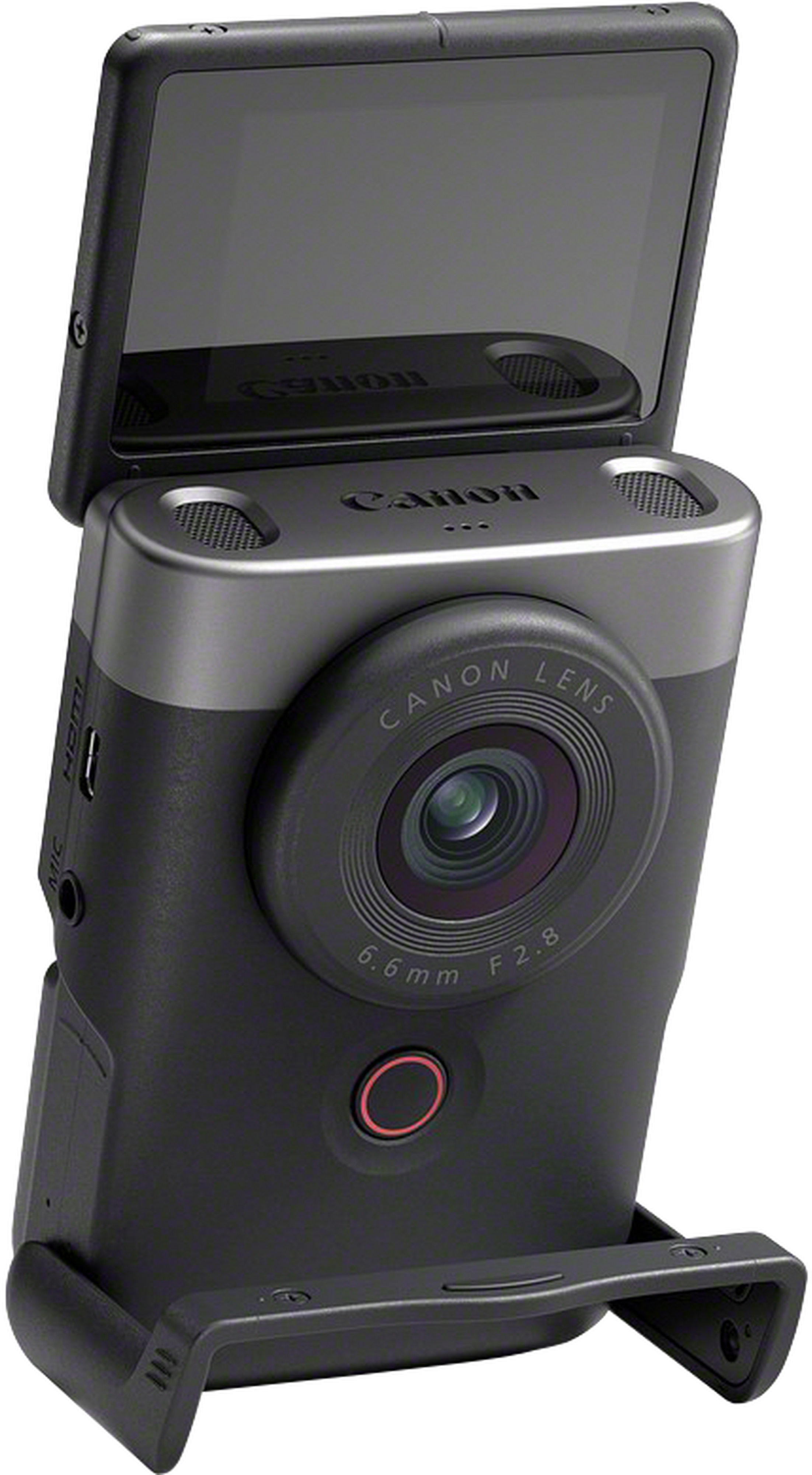 Un appareil photo Canon noir et argenté avec écran rabattable et objectif. Appareil portable.