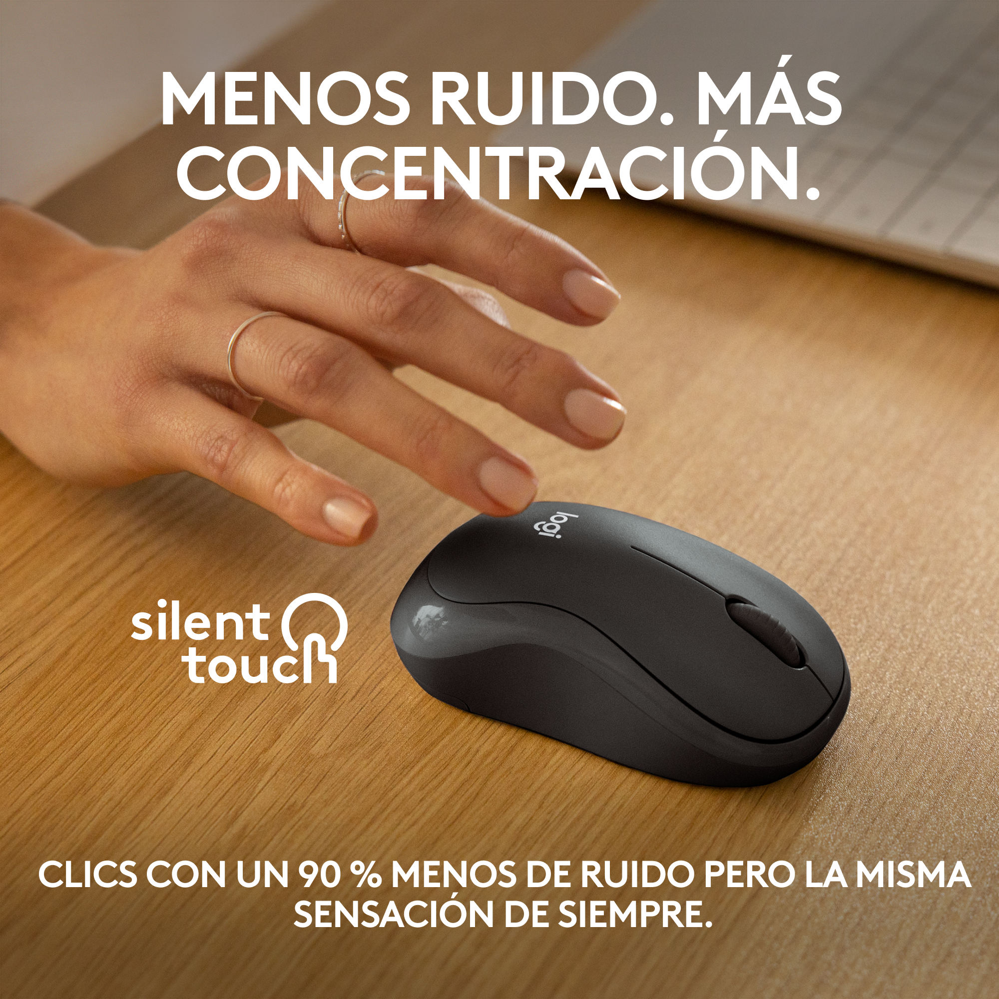 Ratón negro sobre mesa de madera. Texto: 