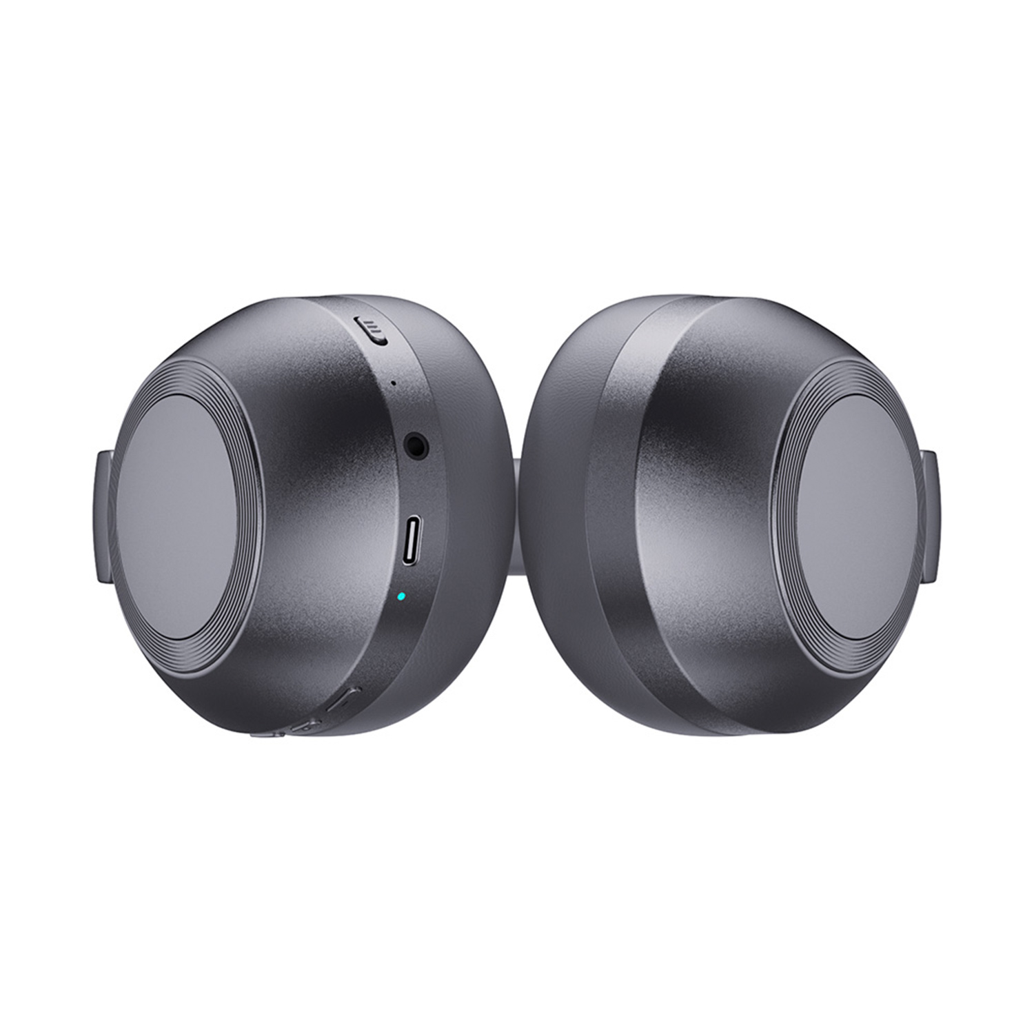 Dos auriculares grises redondos. Vista superior, mostrando las copas.