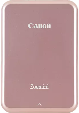 Rózsaszín arany Canon Zoemini fotónyomtató fehér háttér előtt.