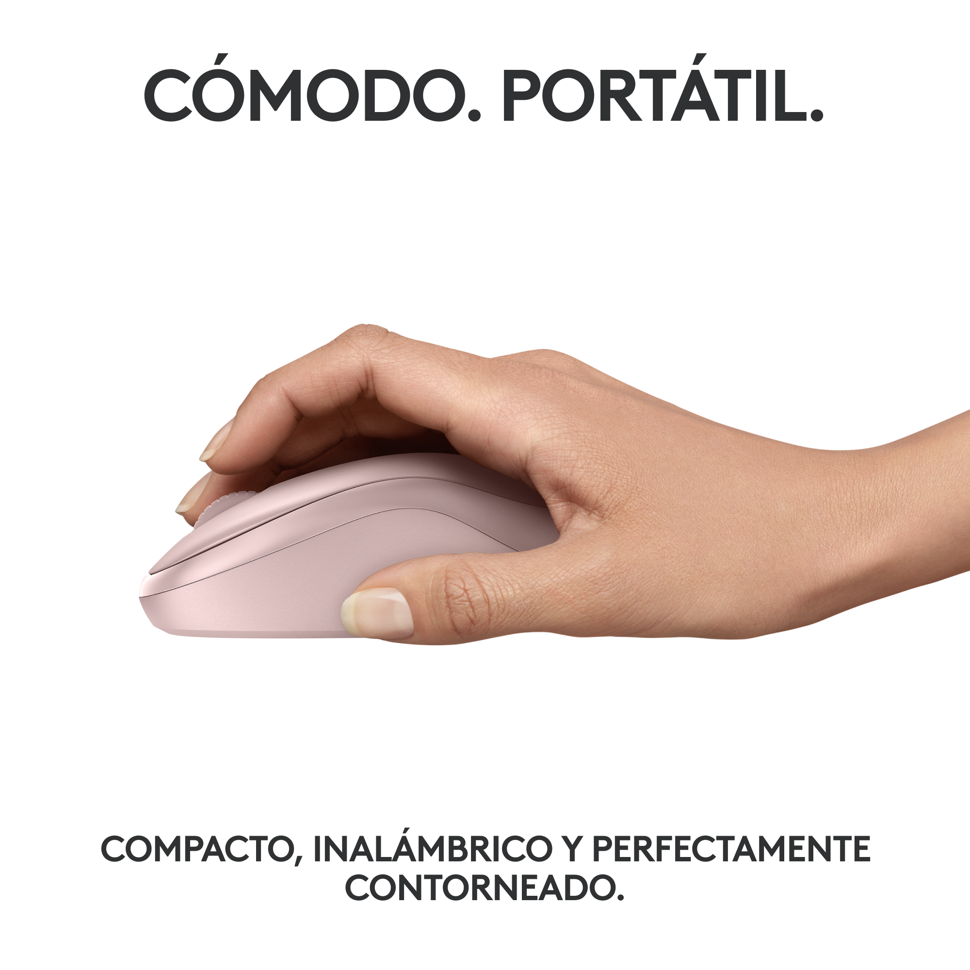 Una mano sosteniendo un ratón de computadora rosa. El ratón está en una superficie blanca.