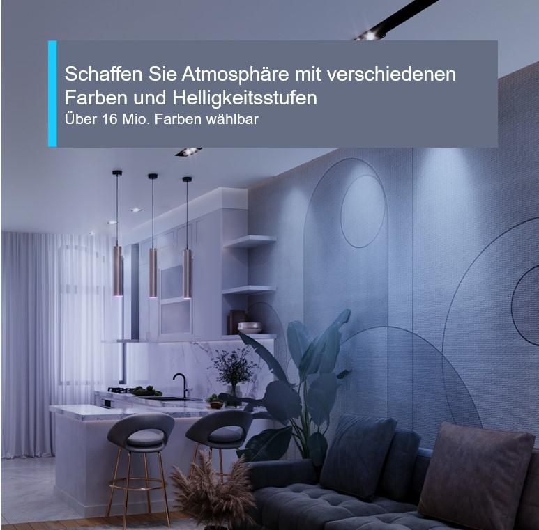Eine moderne Küche mit hellblauem Farbton, Pendelleuchten und einem grauen Sofa.