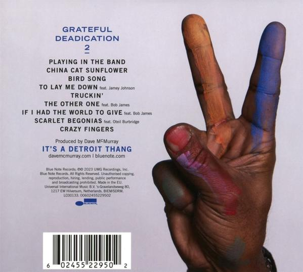 CD-Cover mit Peace-Zeichen-Hand, bunter Farbe und Titelliste.