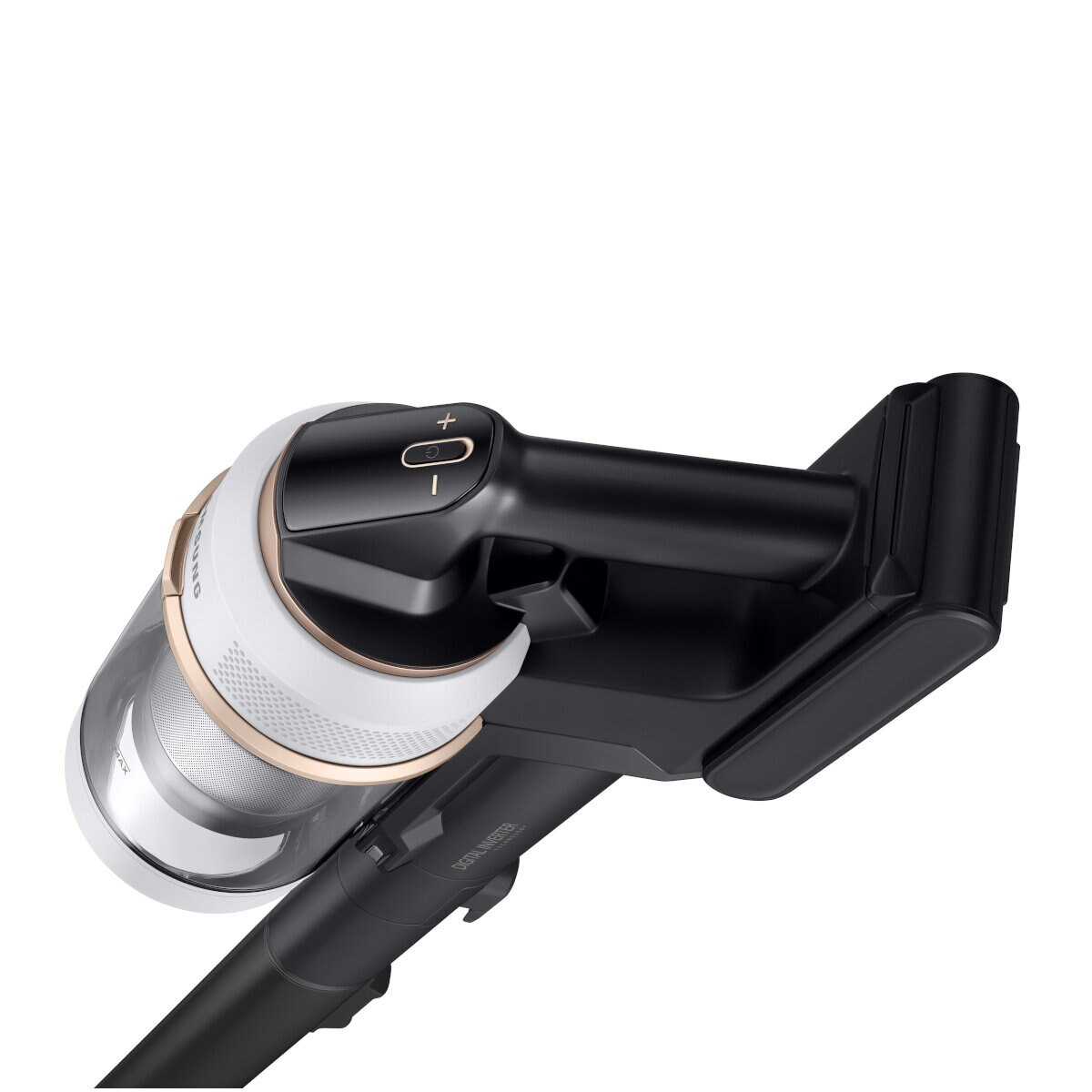 Zbliżenie czarno-białego uchwytu odkurzacza ze złotymi akcentami.