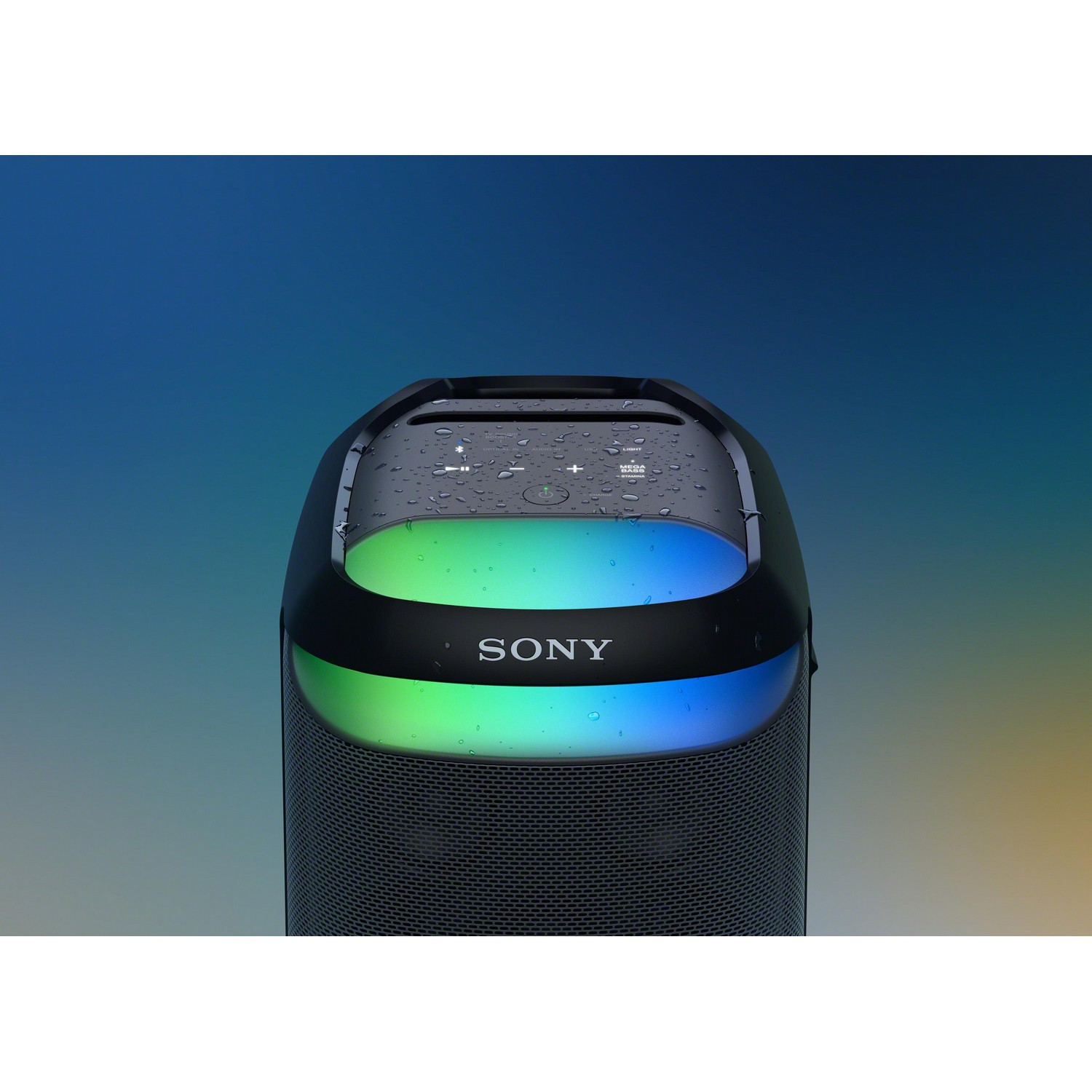 Enceinte Sony noire avec des lumières colorées en haut. Sur un dégradé bleu-vert.