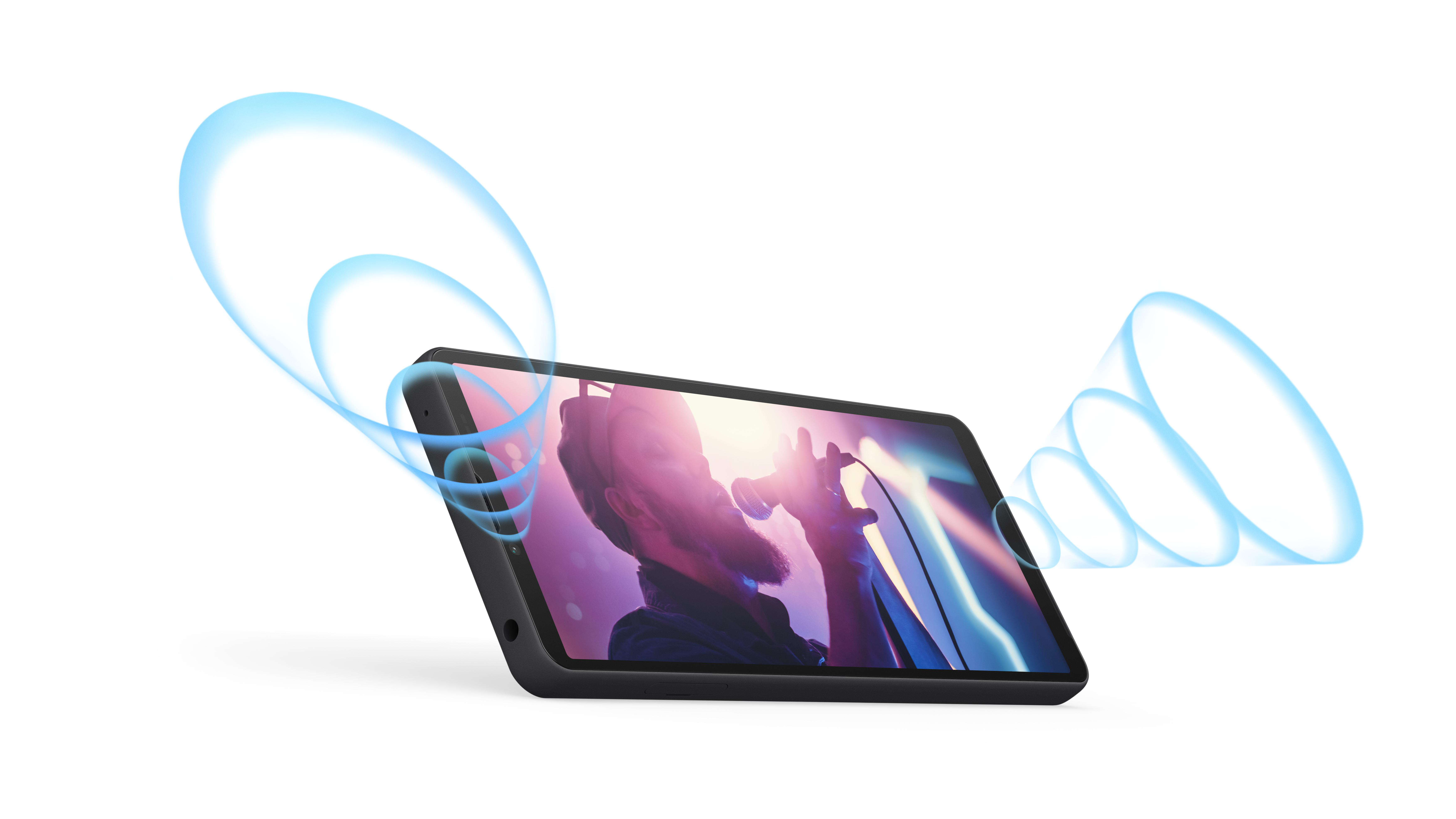 Ein Telefon mit einem Live-Konzert auf dem Bildschirm, umgeben von blauen Schallwellengrafiken auf weißem Hintergrund.