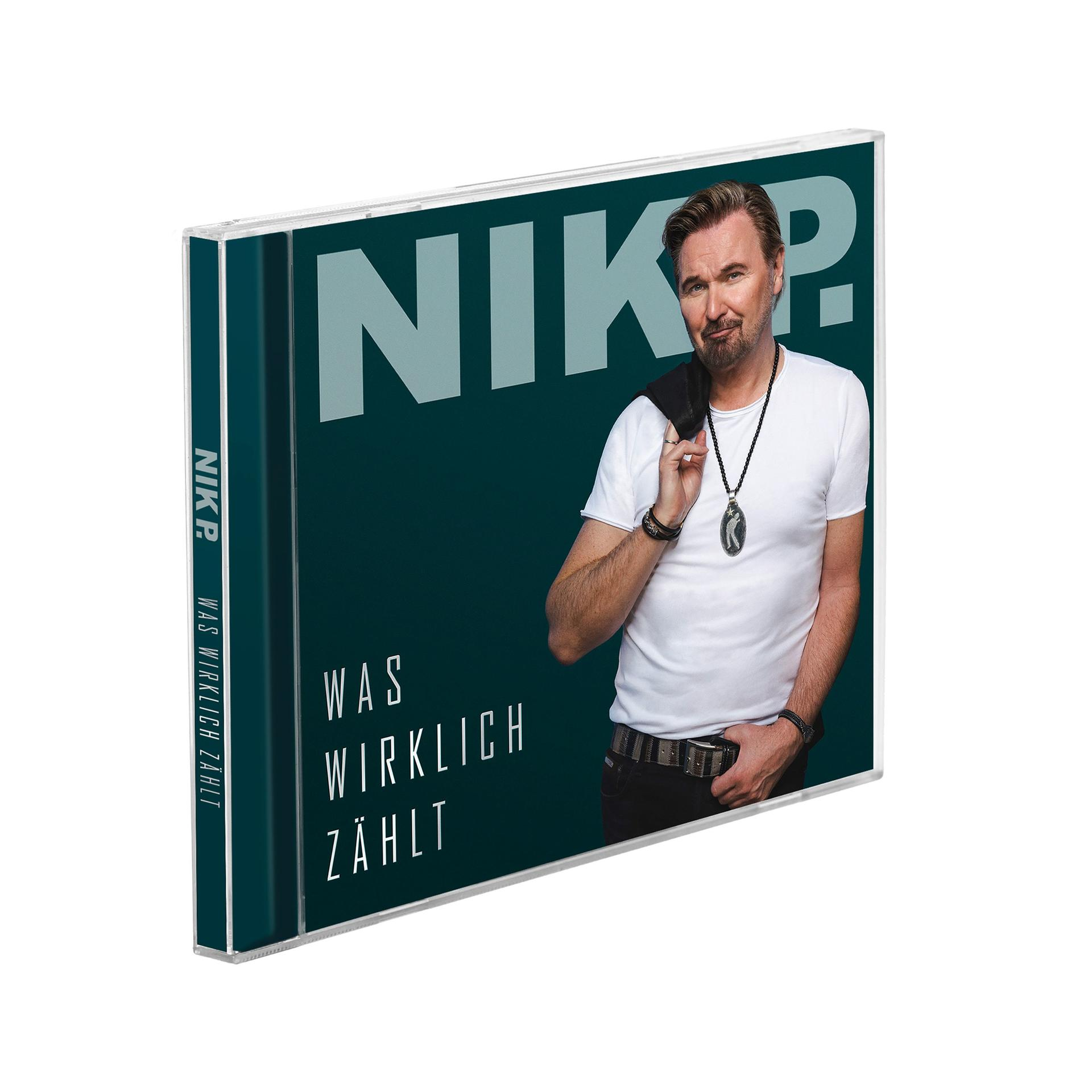 CD-Cover für NIK P. mit dem Titel 'WAS WIRKLICH ZÄHLT' und einer Person im weißen Hemd.