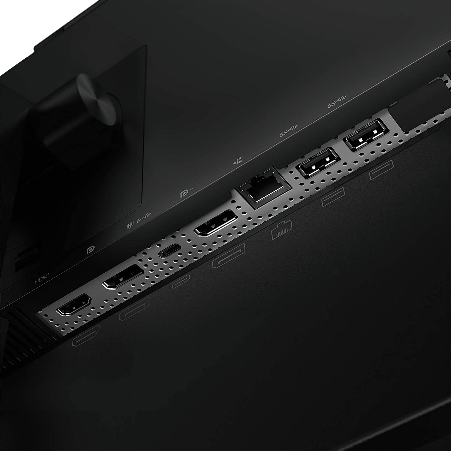Primer plano del panel trasero de un monitor de ordenador. Se ven puertos como HDMI, USB y otros.