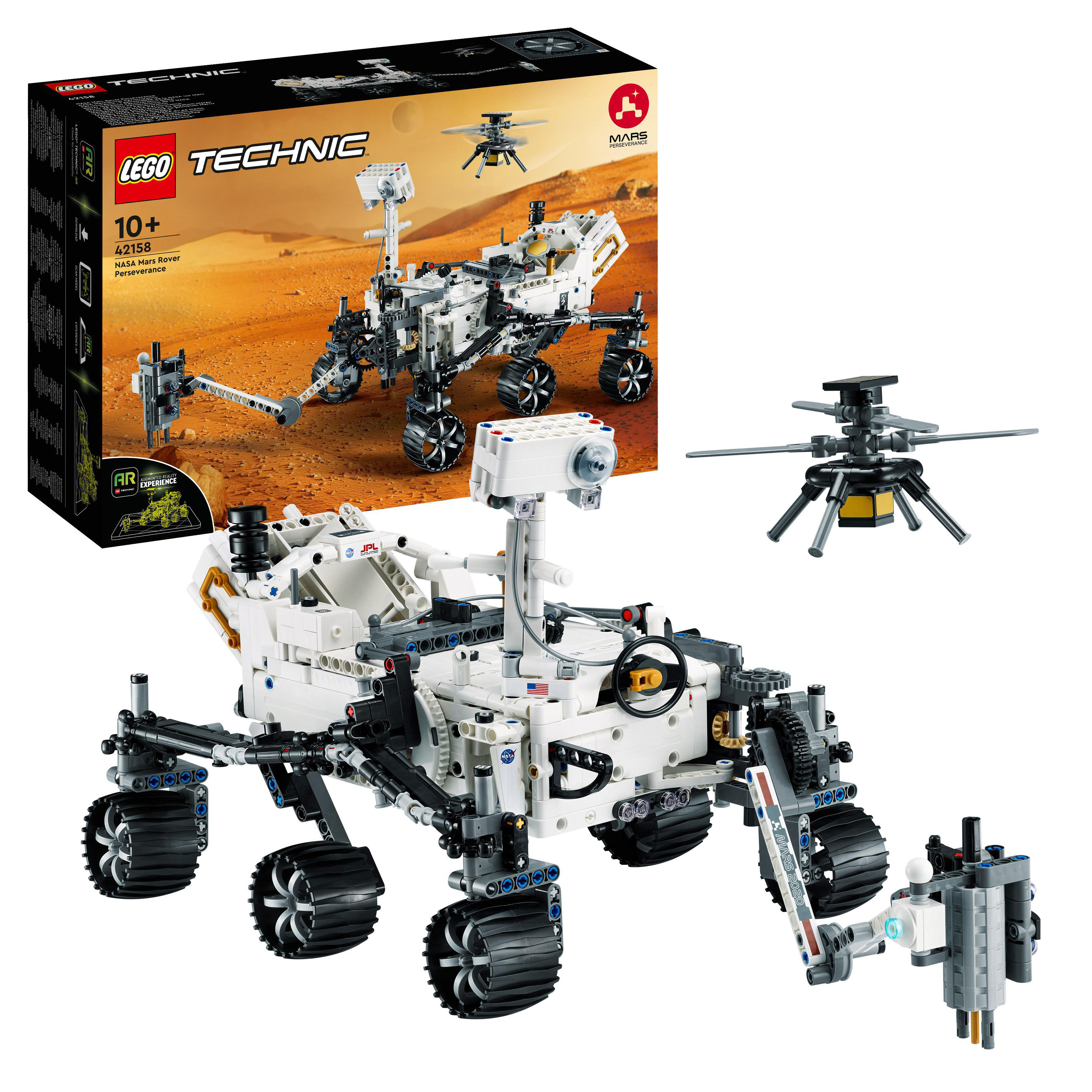 LEGO NASA Mars Rover Set mit Box. Weißer Rover mit kleinem Hubschrauber. Weißer Hintergrund.