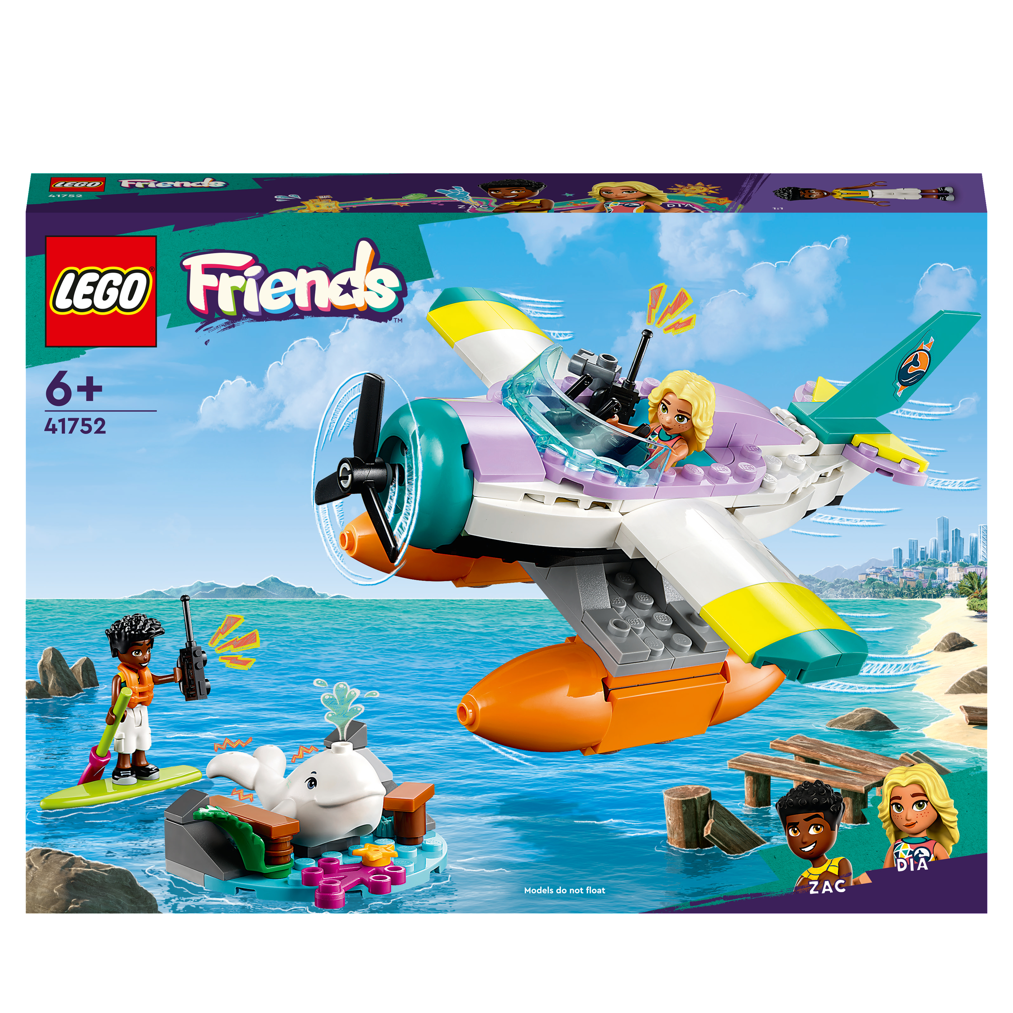 Lego Friends Set mit einem Wasserflugzeug, Figuren und einem Wal. Die Szene ist ein Strand.