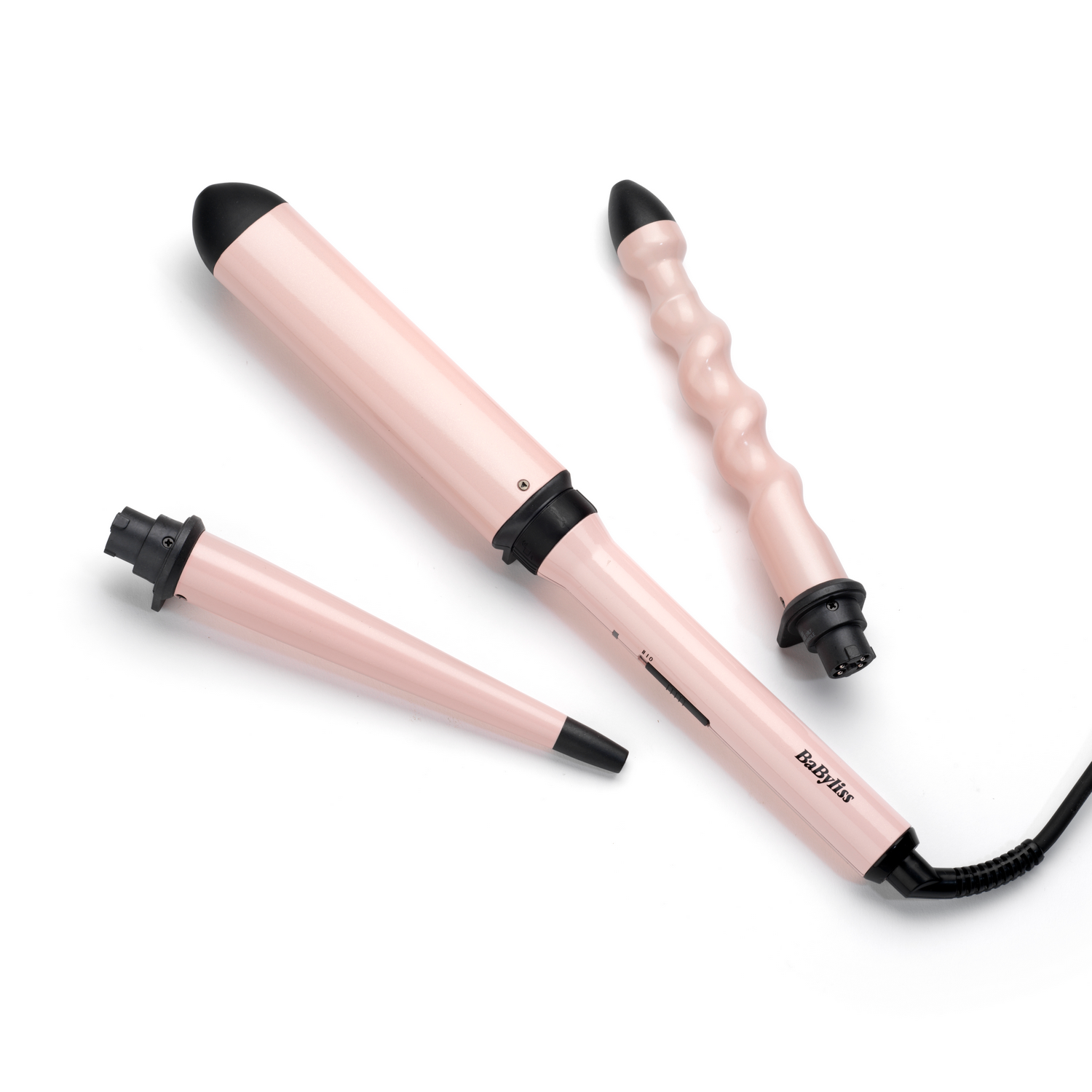 Roze Babyliss krultangset, met drie verwisselbare opzetstukken. Zwarte basis en snoer.
