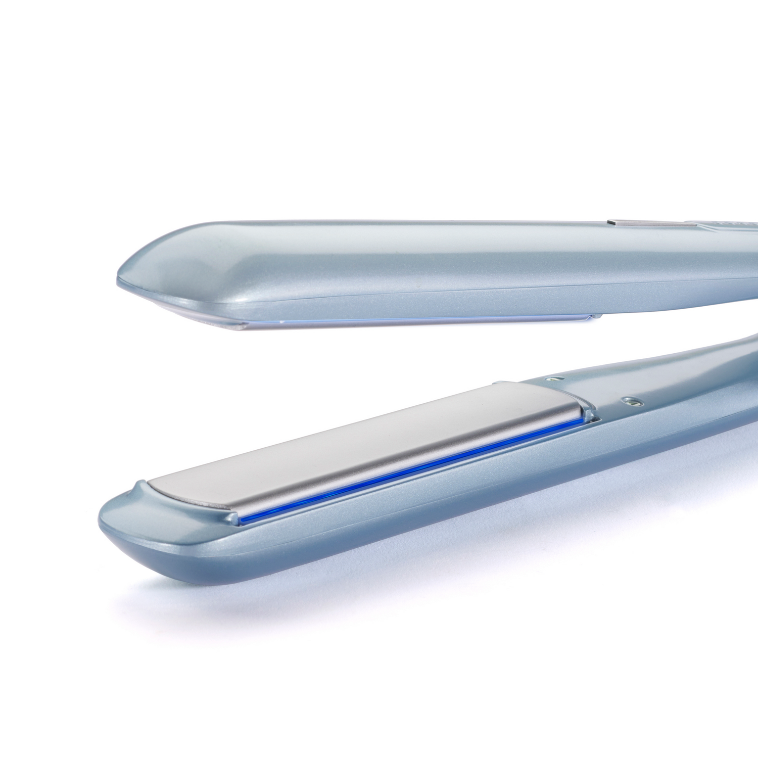 Close-up of a light blue hair straightener, open, on a white background.