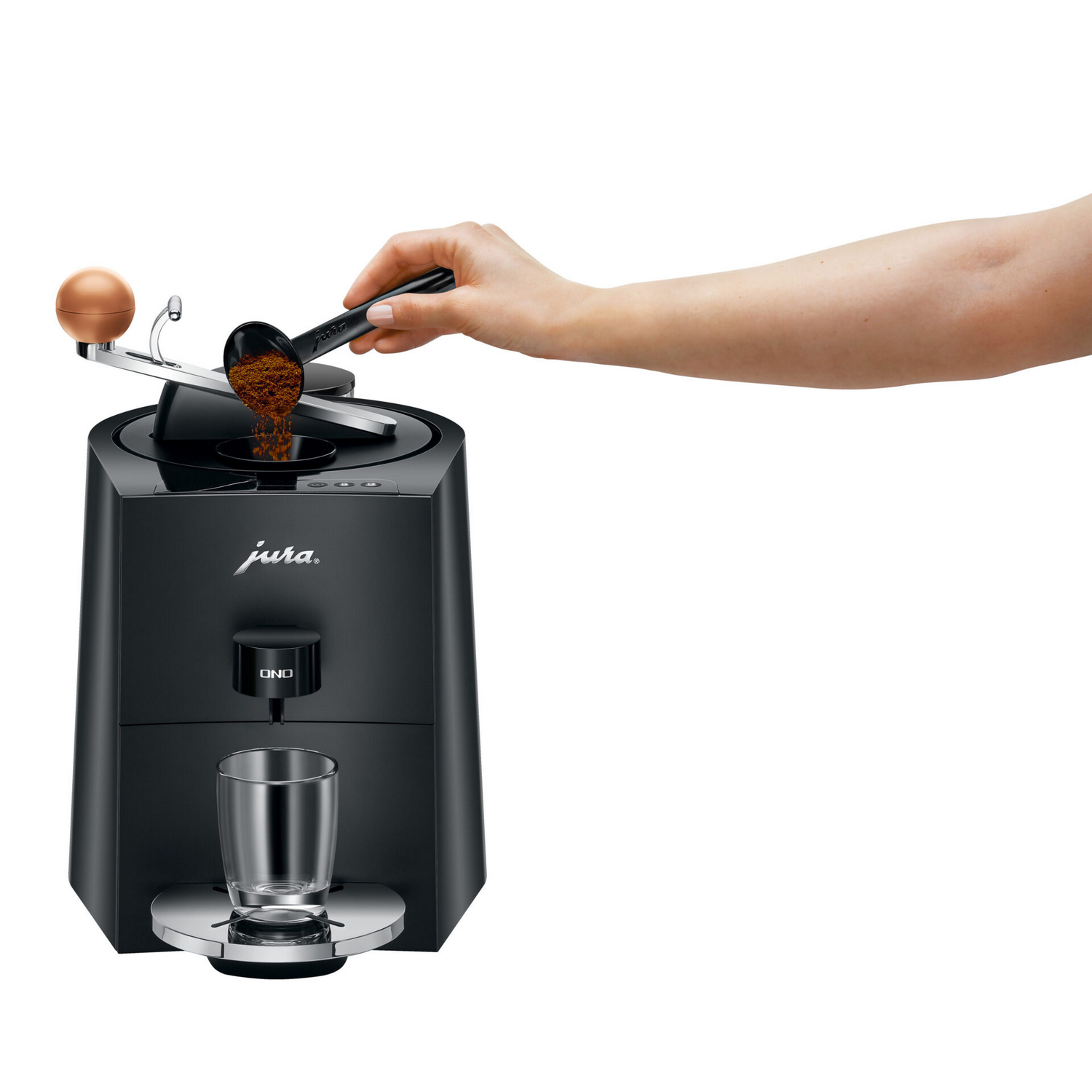 Black coffee grinder with a hand pouring grounds. Coffee cup on the bottom.