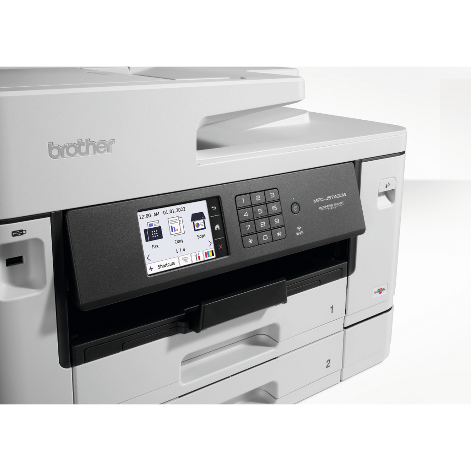 A white Brother multi-function printer with a black control panel showing a display and buttons. 