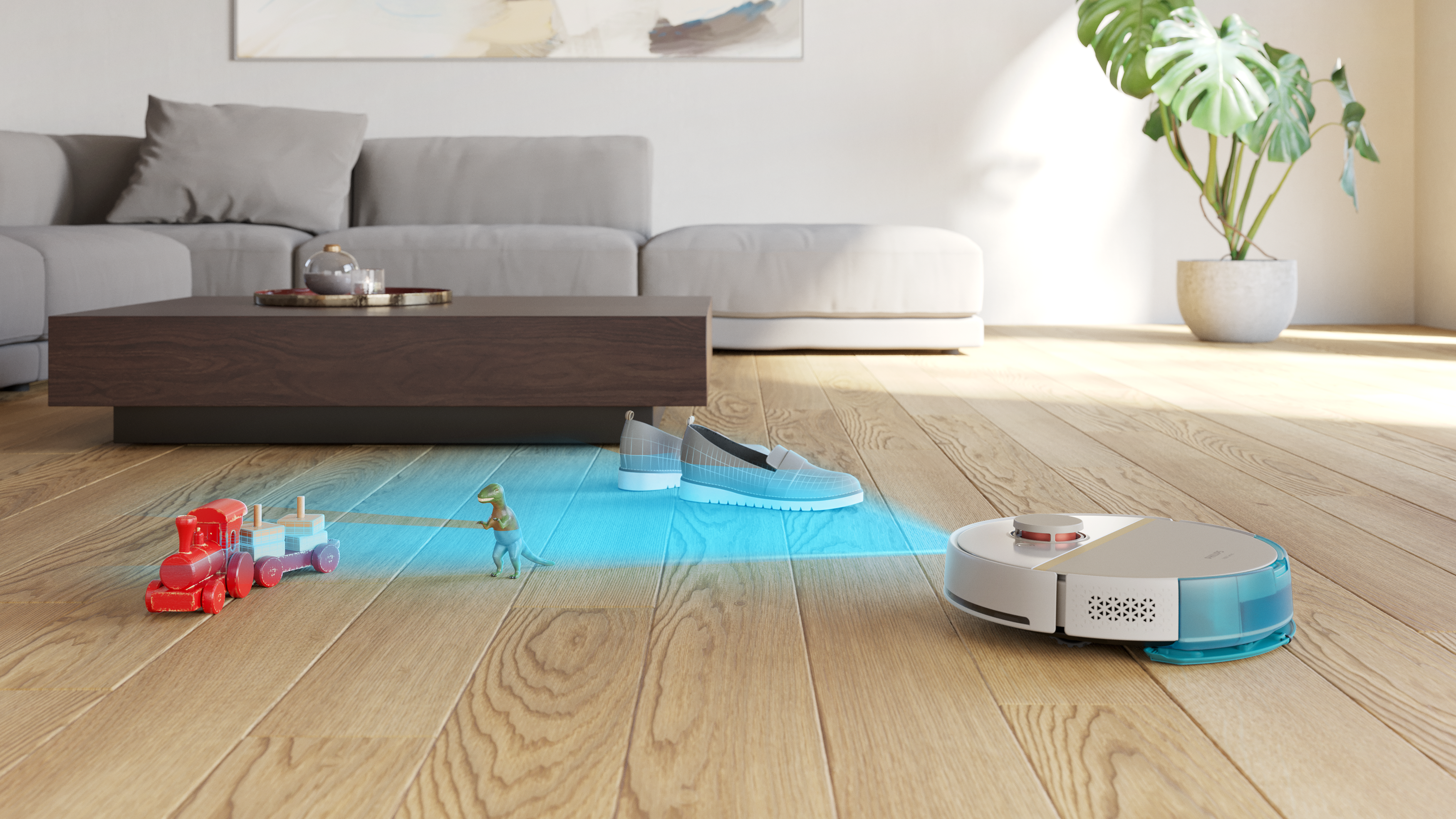 Egy robotporszívó fa padlót takarít játékvonattal és cipőkkel a közelben.
