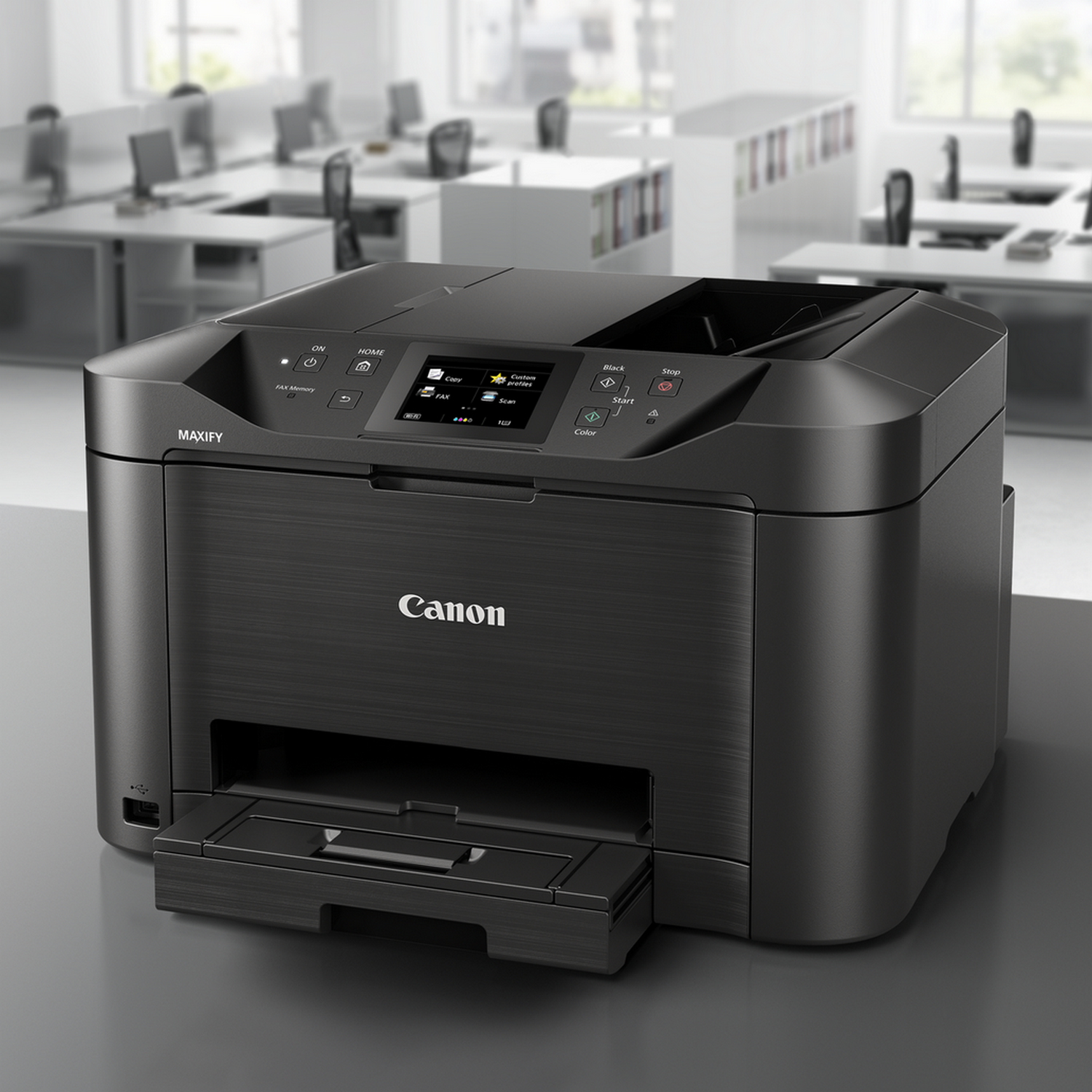 Zwarte Canon Maxify printer op een bureau, met de papierlade open, in een kantoor.