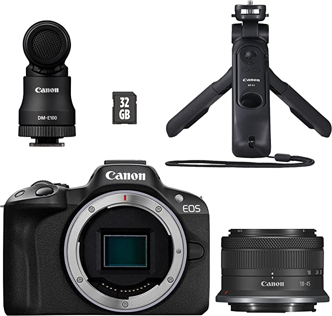 Kit de cámara Canon con lente, micrófono y trípode.