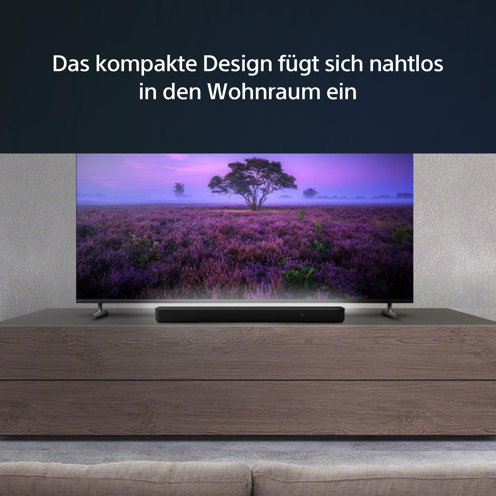 Ein Fernsehbildschirm mit einer Landschaftsszene und einer Soundbar.