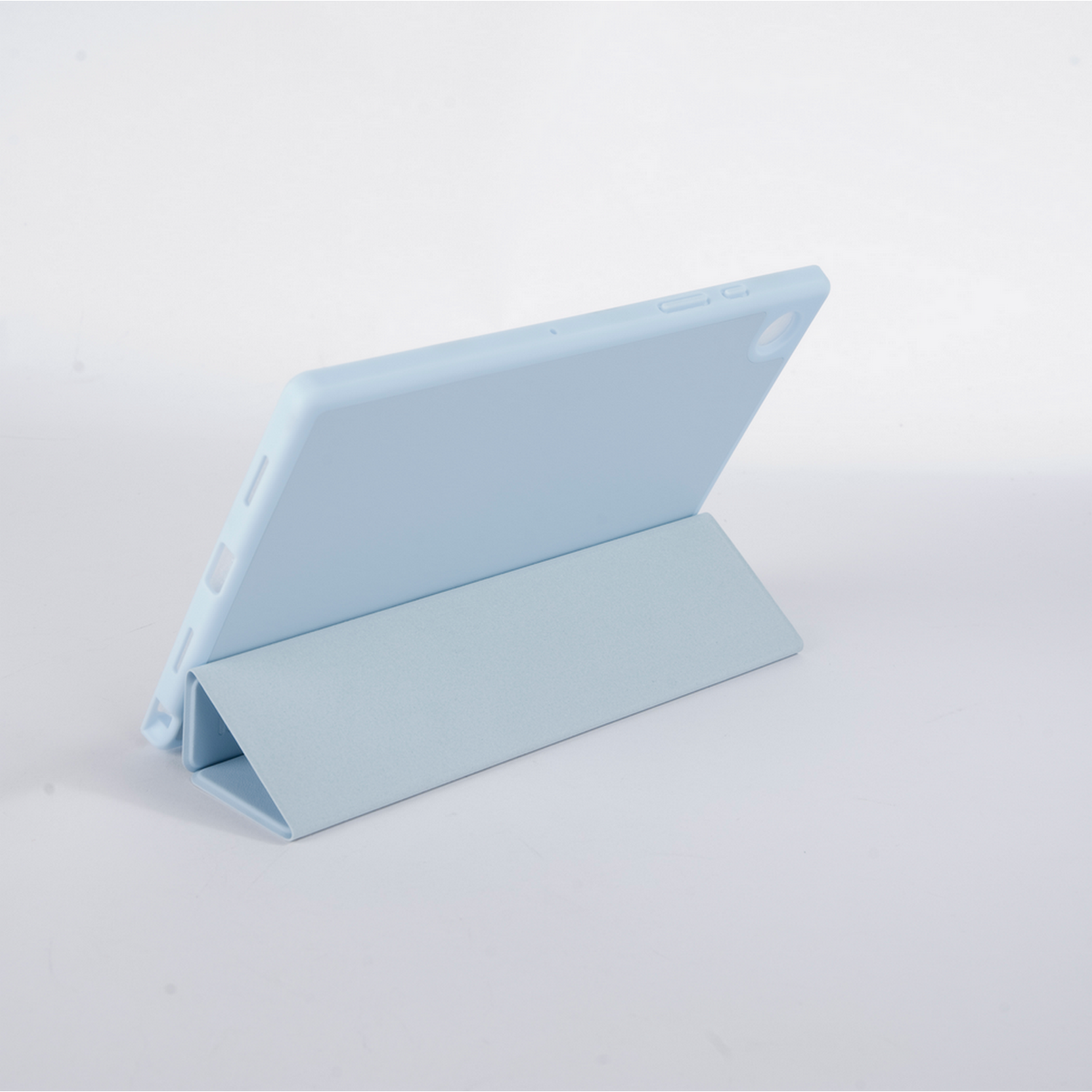 A light blue tablet case stands on a white surface.