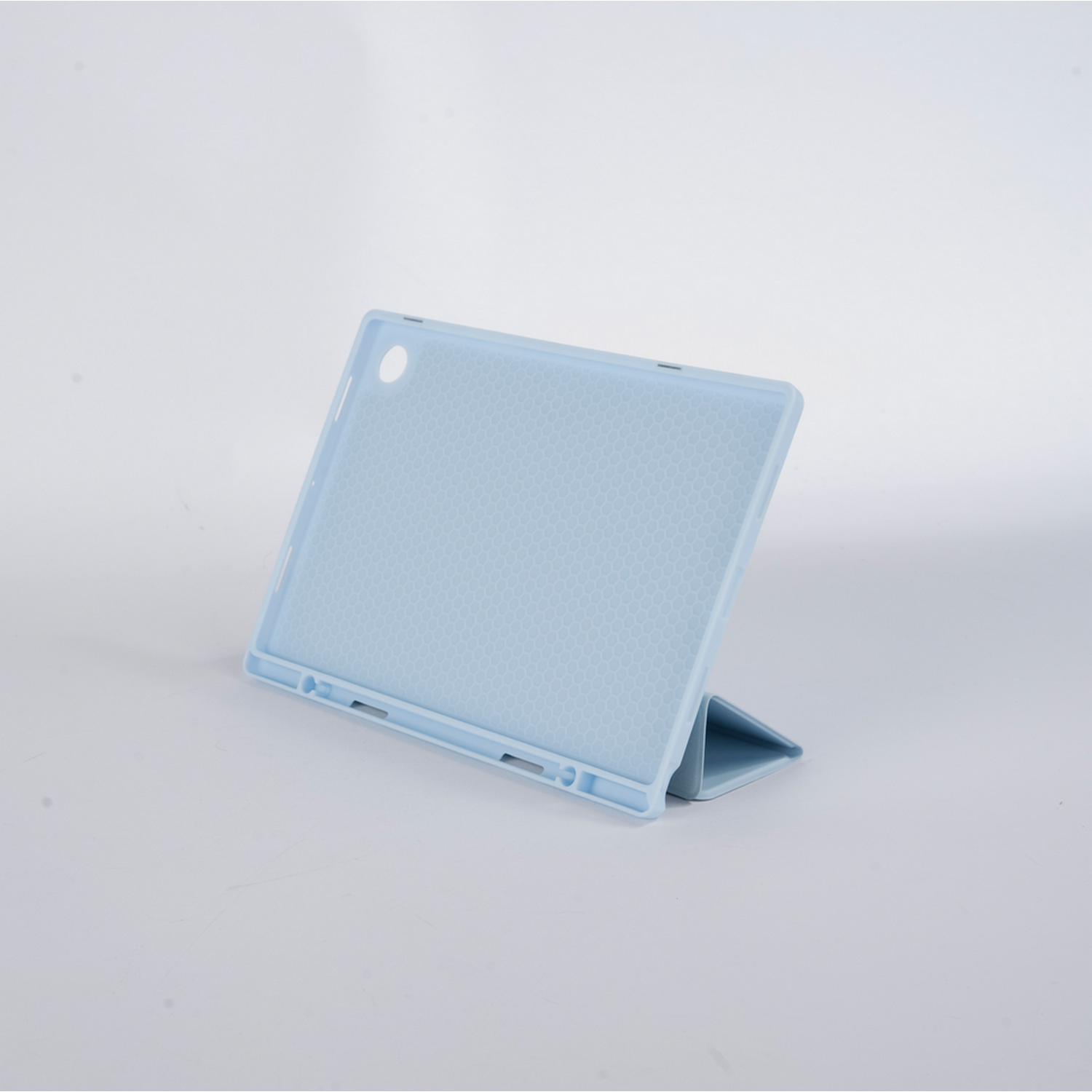 A light blue tablet case, standing open. It has a patterned interior.
