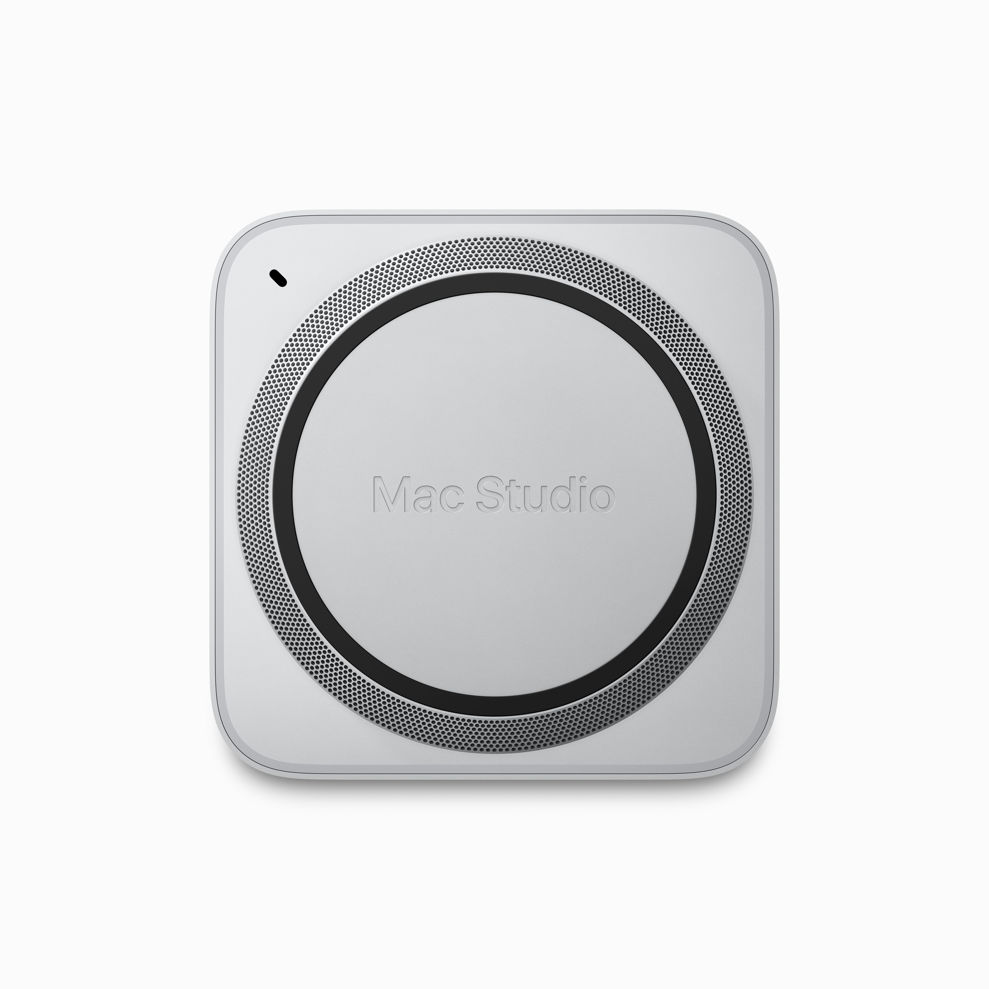 Mac Studio Computergerät, quadratische Form, silberne Farbe. Schwarzes kreisförmiges Design oben.