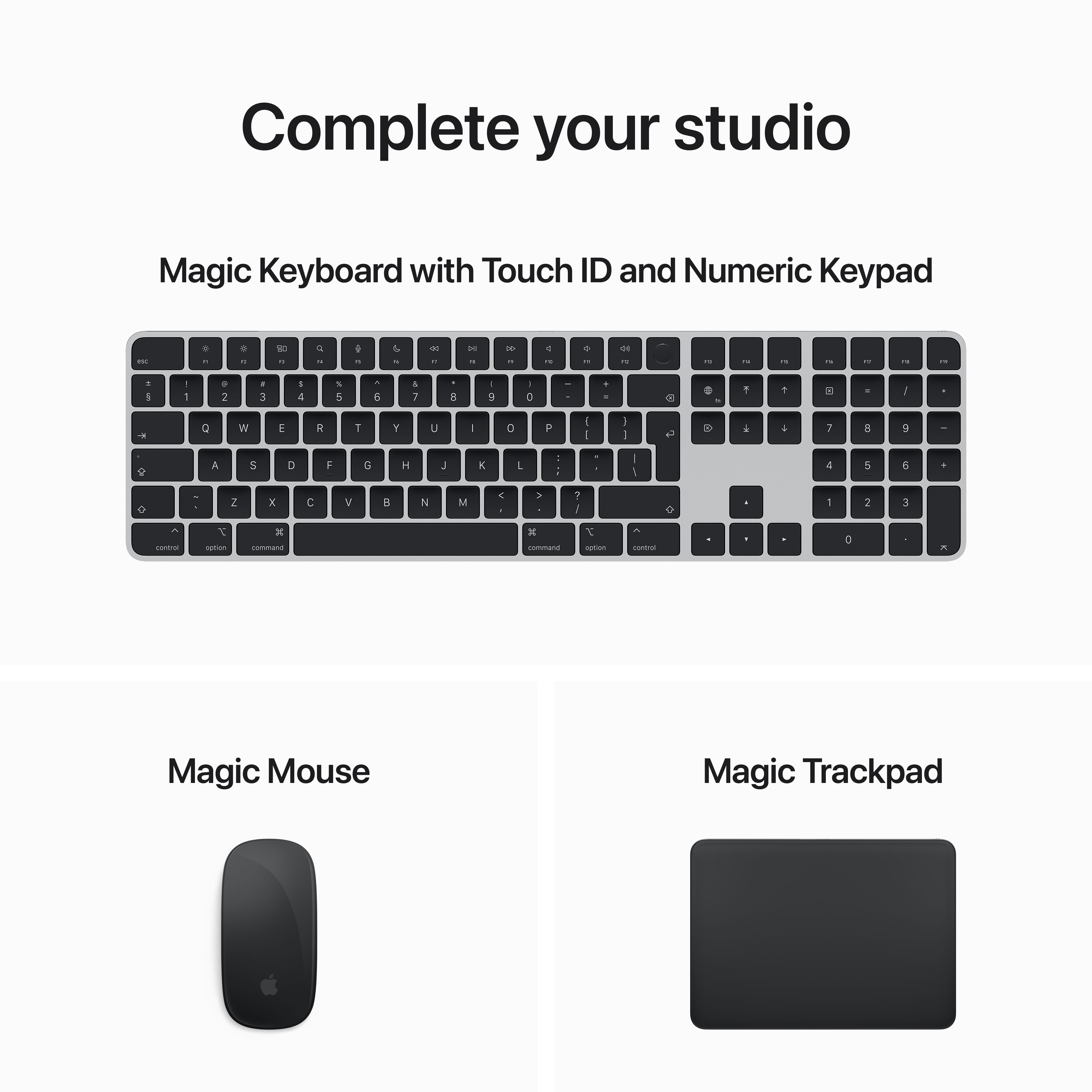 Eine Tastatur, eine Maus und ein Trackpad. Alle sind schwarz und silber. Die Tastatur hat einen Nummernblock.
