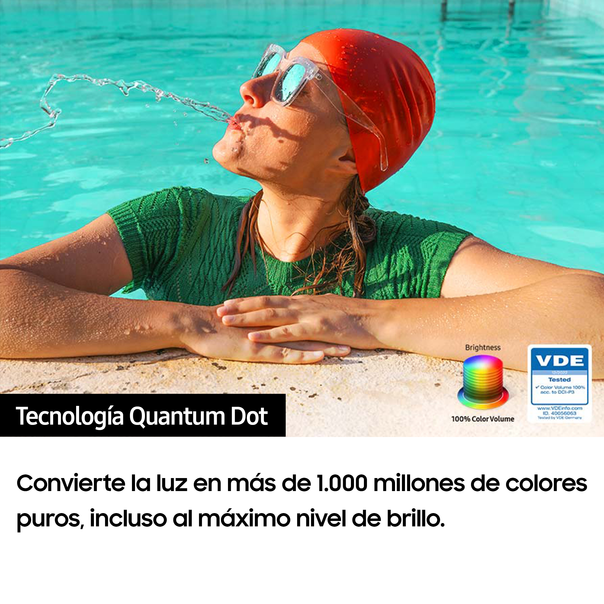 Mujer en piscina con agua saliendo de la boca. Anuncio de tecnología Quantum Dot.