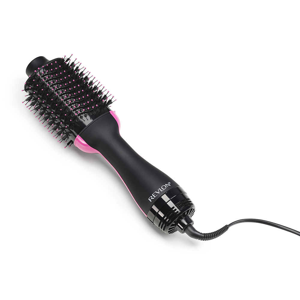 Siyah ve pembe saç kurutma makinesi. Revlon marka adı görünür.